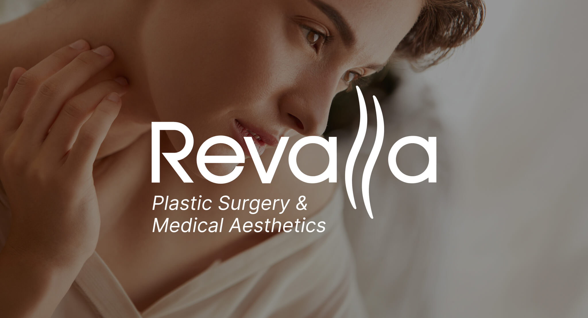 Clean, professional medical spa treatment room with neutral tones at Revalla Plastic Surgery & Medical Aesthetics in Littleton